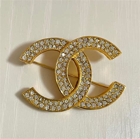 coco chanel brooch replica white|chanel brooch price.